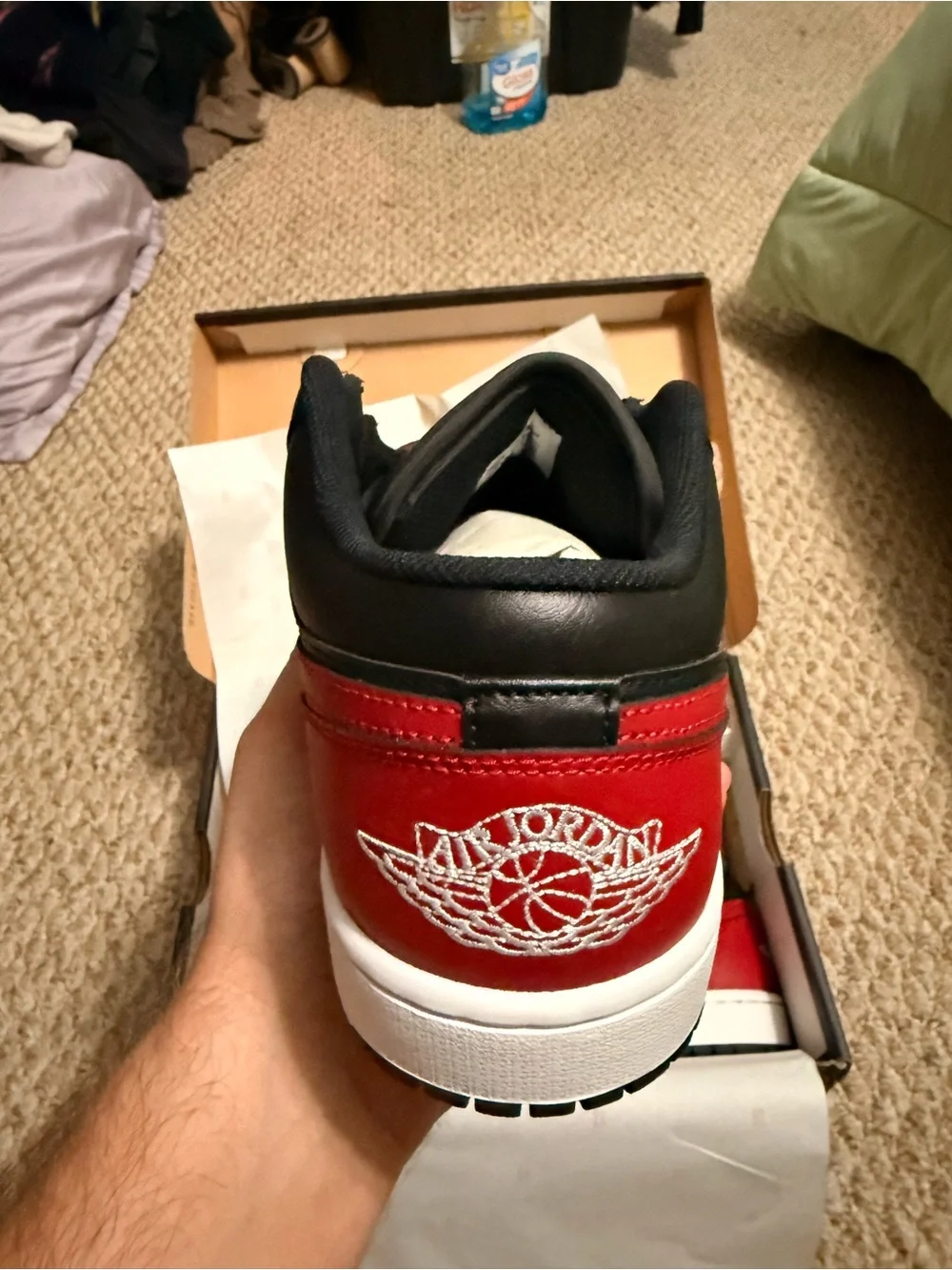 Nike Men’s Jordan Air 1 Black and Red Low-Top Sneakers